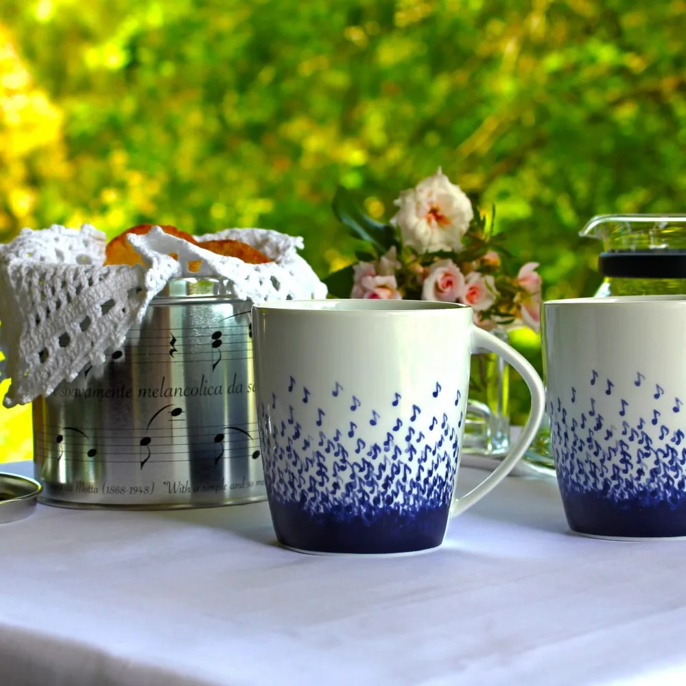 Kaffeebecher Wassermusik in Blechdose