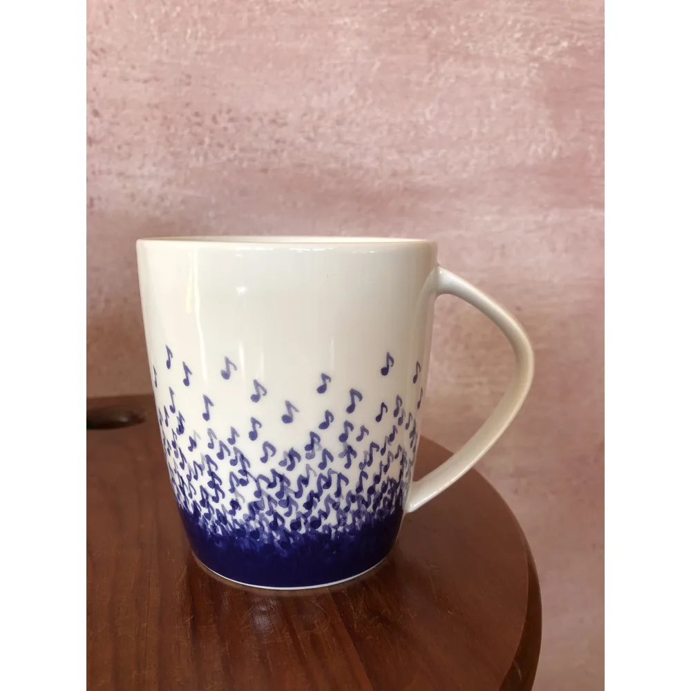Kaffeebecher Wassermusik in Blechdose